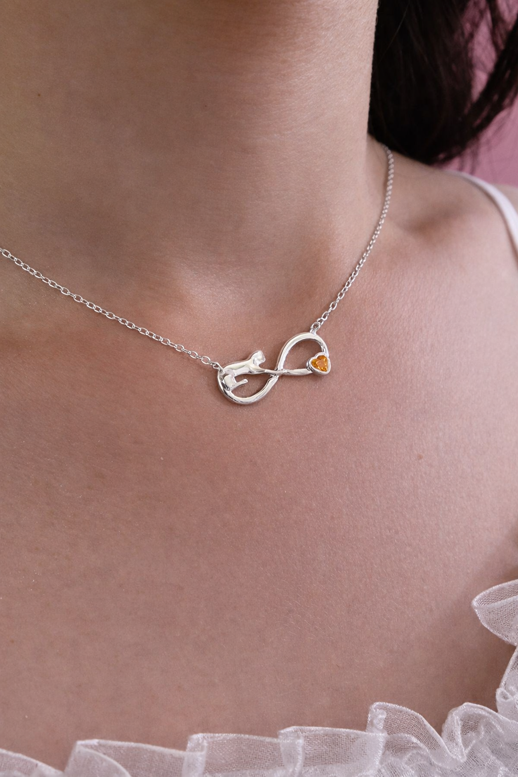 Cadena de plata 9.25 con dije de infinito y gatito