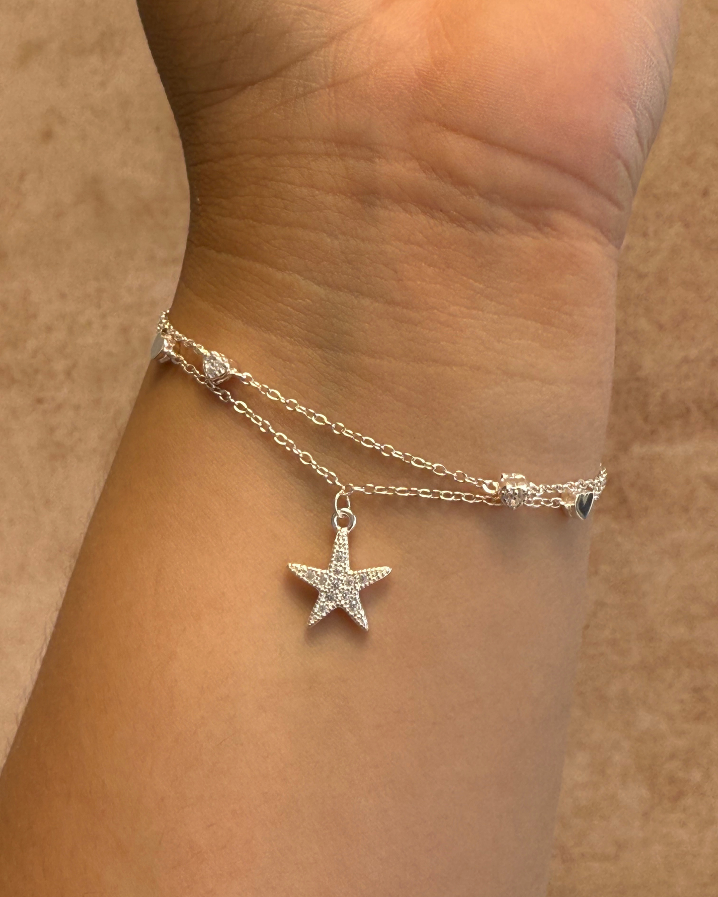 Pulsera de plata italina 9.25 con dije de estrellas