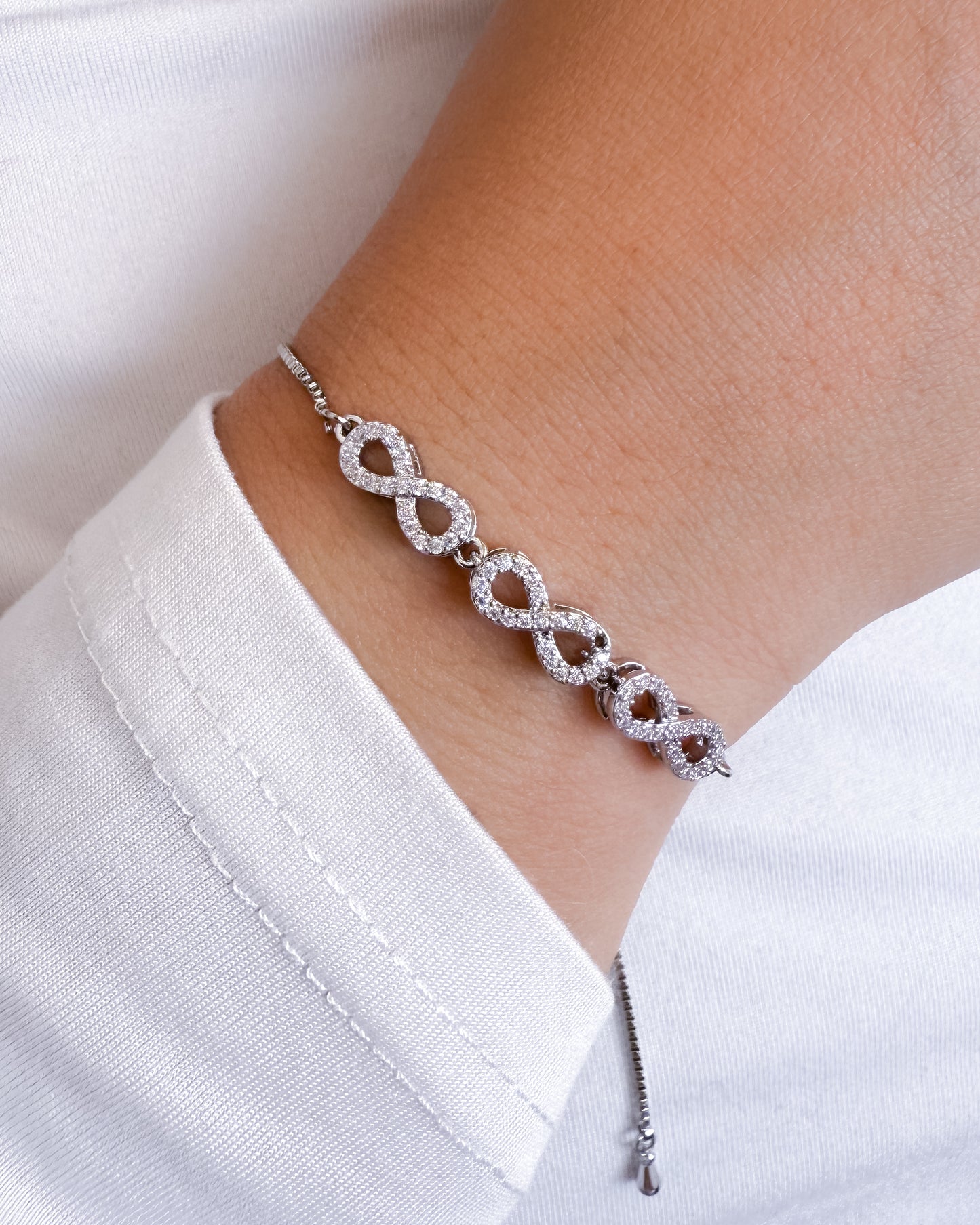 PULSERA DE INFINITOS PLATEADA