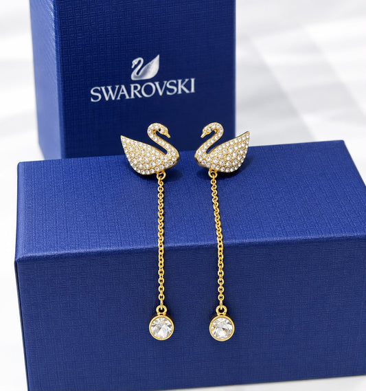 Aretes largos de cisne dorado con cristal colgante